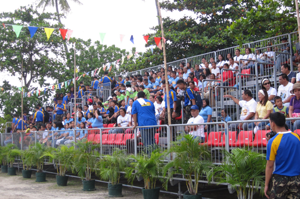 The bleacher, full of representatives coming from different government agencies, schools, and community members, during the opening ceremony. 